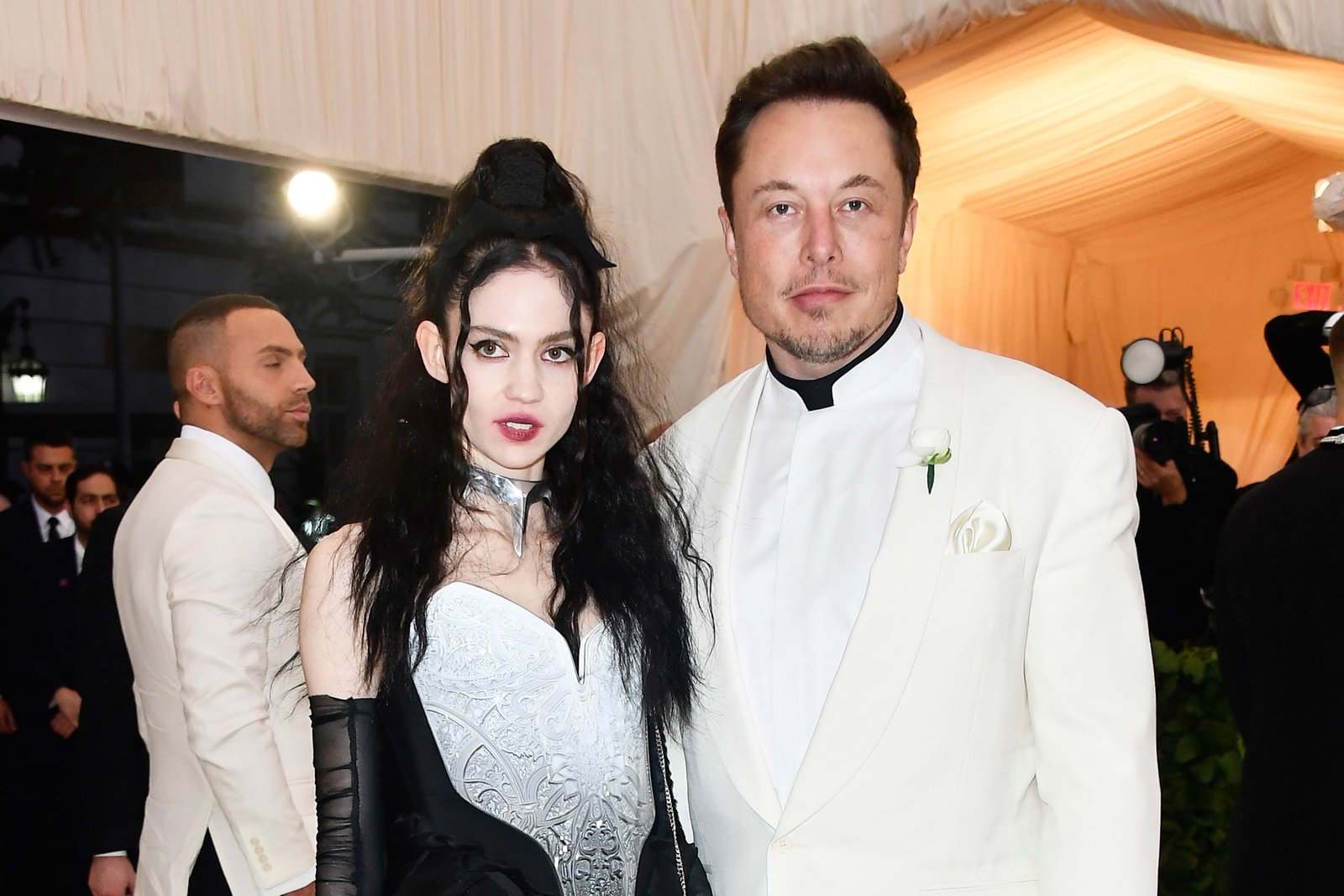 Elon Musk says he and partner Grimes are semi-separated